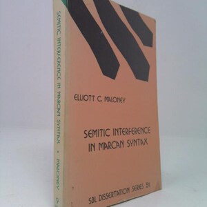 May include: A hardcover book titled "Semitic Interference in Marcan Syntax" by Elliott C. Maloney. The book has a peach-colored cover with black abstract shapes and text. The spine is off-white with green at the top.