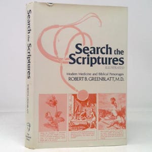 May include: A hardcover book titled "Search the Scriptures" with the subtitle "Modern Medicine and Biblical Personages." The cover is off-white with pink and blue text and illustrations. The author's name is Robert B. Greenblatt, M.D.