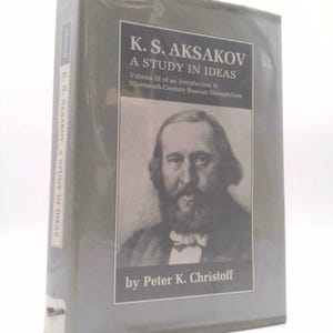 May include: A gray book cover with the title "K.S. Aksakov: A Study in Ideas" and the author "Peter K. Christoff". The cover features a black and white portrait of a man with a beard.
