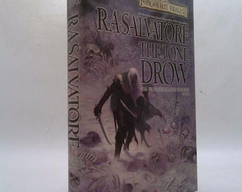 May include: A hardcover book titled "R.A. Salvatore The Lone Drow" from the Forgotten Realms series. The cover features a dark figure with a sword amidst a misty, skeletal landscape. The spine displays the author's name.