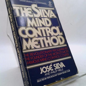 May include: A blue book with the title "The Silva Mind Control Method" by Jose Silva and Philip Miele. The book is a revolutionary program by the founder of the world's most famous mind control course. It is selected by Psychology Today Book Club.