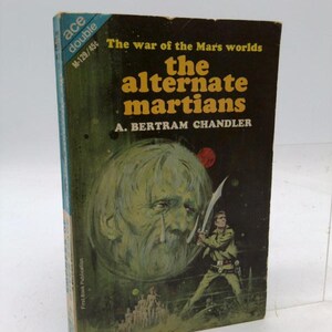 May include: Vintage paperback book titled "The War of the Mars Worlds: The Alternate Martians" by A. Bertram Chandler. The cover features a green-toned illustration of a Martian face, a figure with a sword, and the text "ace double".