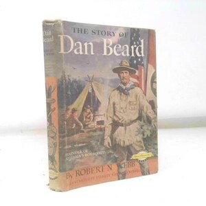 May include: A vintage book titled "The Story of Dan Beard" by Robert N. Webb. The cover features an illustration of a man in a hat, a tent, and the American flag. The book is a biography of the founder of America's Boy Scouts.