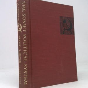 May include: A hardcover book titled "The Soviet Political System" by Alfred G. Meyer. The book has a reddish-brown cover with gold lettering and a black hammer and sickle symbol. The book is published by Random House.