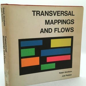 May include: A hardcover book titled Transversal Mappings and Flows by Ralph Abraham and Joel Robbin. The off-white cover features black text and a central black rectangle containing six horizontal colored bars in blue, yellow, green, and orange.