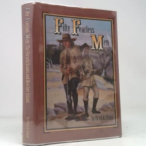 May include: A hardcover book titled "Fifty Fearless Men" by Orvel A. Criqui. The cover features an illustration of two men in period clothing, set against a landscape. The book is wrapped in clear plastic.