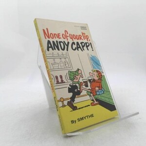 May include: A paperback book titled None of your lip, ANDY CAPP! by SMYTHE. The yellow cover features a cartoon illustration of two characters in a pub setting, with the title text in bold black and red lettering at the top of the front cover.