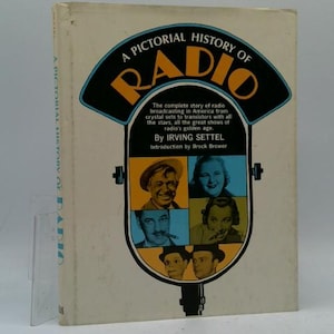 May include: A vintage book titled "A Pictorial History of Radio" with a retro design. The cover features a stylized radio graphic with the title in bold letters and images of radio personalities. The book's spine is visible.