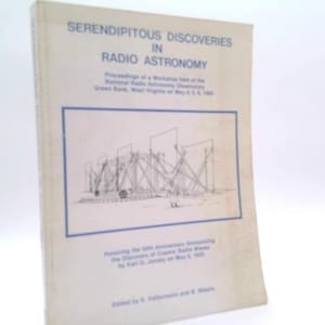 May include: A softcover book titled Serendipitous Discoveries in Radio Astronomy with a cream-colored cover and blue text. The cover features a line drawing of a radio telescope array inside a blue rectangular frame and lists workshop details.