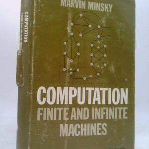 May include: A vintage book titled "Computation: Finite and Infinite Machines" by Marvin Minsky. The cover is olive green with white text and a diagram. The book is part of the Prentice-Hall Series in Automatic Computation.