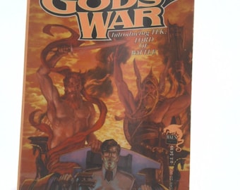 May include: The Gods of War book cover featuring a fantasy illustration of two warriors in a fiery landscape. The book is by Christopher Stasheff and introduces Tek: Lord of Battle.