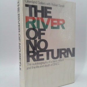 May include: A white book cover with the title "The River of No Return" in black, red, and green lettering. The book is an autobiography of a black militant and the life and death of SNCC.