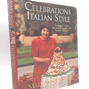 May include: A cookbook titled "Celebrations Italian Style" featuring a woman in a red dress. The book cover displays the title in large white letters, with the author's name, Mary Ann Esposito, at the bottom. The book is about Italian recipes.
