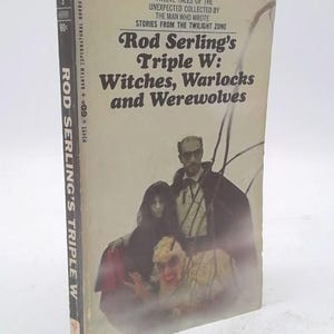 May include: A vintage paperback book titled "Rod Serling's Triple W: Witches, Warlocks and Werewolves." The cover features illustrations of three figures in a misty, supernatural setting. The book is a collection of stories from The Twilight Zone.