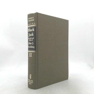 May include: A hardcover book with a grey fabric cover. The spine features the text Frank E. Vandiver, Black Jack The Life and Times of John J. Pershing, the Roman numeral II, and the Texas A&M University Press logo in white and gold lettering.