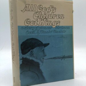 May include: A vintage paperback book titled "All God's Children Got Wings." The cover features an illustration of an older man in a hat and coat, with the title in large, stylized lettering. The book's spine also displays the title.