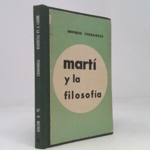 May include: A vintage book titled "Martí y la filosofía" by Wilfredo Fernandez. The book has a light green cover with a white circle containing the title in bold black letters. The spine is dark green.