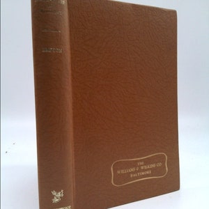 May include: A brown leather-bound book with gold lettering on the spine. The title is "Black Star" and the author is "Livingstone". The book is published by "The Williams & Wilkins Co. Baltimore".