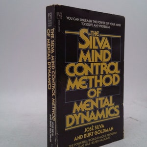 May include: A black book with gold lettering titled "The Silva Mind Control Method of Mental Dynamics" by José Silva and Burt Goldman. The book cover features the text "You can unleash the power of your mind to solve any problem!" and "The powerful, world-famous program that has helped millions!"