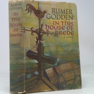 May include: A vintage book cover for "In This House of Brede" by Rumer Godden. The cover features a weathered appearance with a rooster weathervane illustration. The title and author's name are prominently displayed in a serif font, with the publisher's name, Viking, at the bottom.