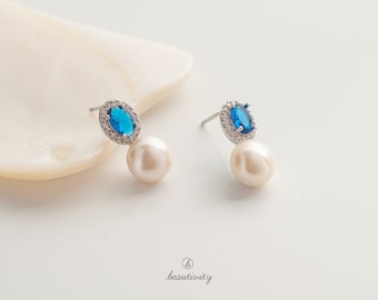 Freshwater Pearl Stud Earrings • 14K White Gold Plated, Blue Topaz
