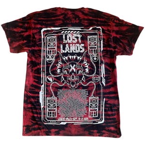 May include: Red and black tie-dye t-shirt featuring a white graphic on the back. The graphic includes the text "LOST LANDS" above a dinosaur skull design. Below the design is the text "LEGEND VALLEY - SEPT. 19-21 2025".