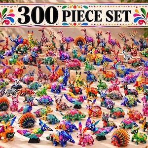 May include: A 300 piece set of small, vibrantly colored animal figurines featuring intricate patterns. The collection includes various creatures such as birds, rabbits, and hedgehogs, all displayed together with the text 300 PIECE SET.