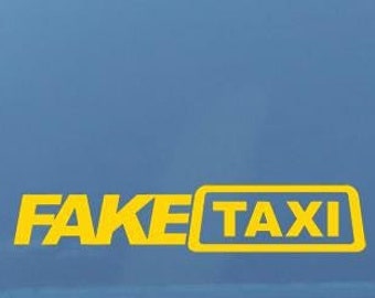 May include: A yellow sticker on the back window of a car that says "FAKE TAXI".