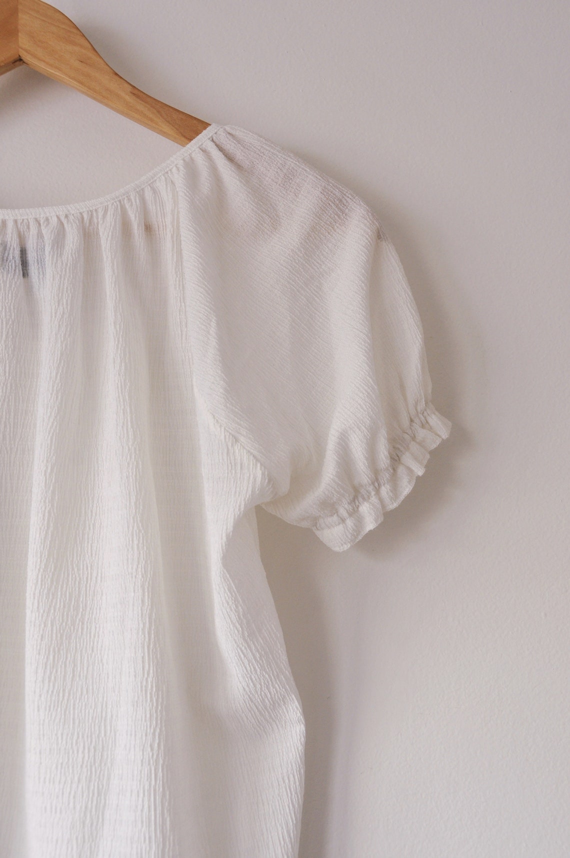 Light & Airy White Textured Sheer Cropped Blouse With Ruffled Sleeves ...