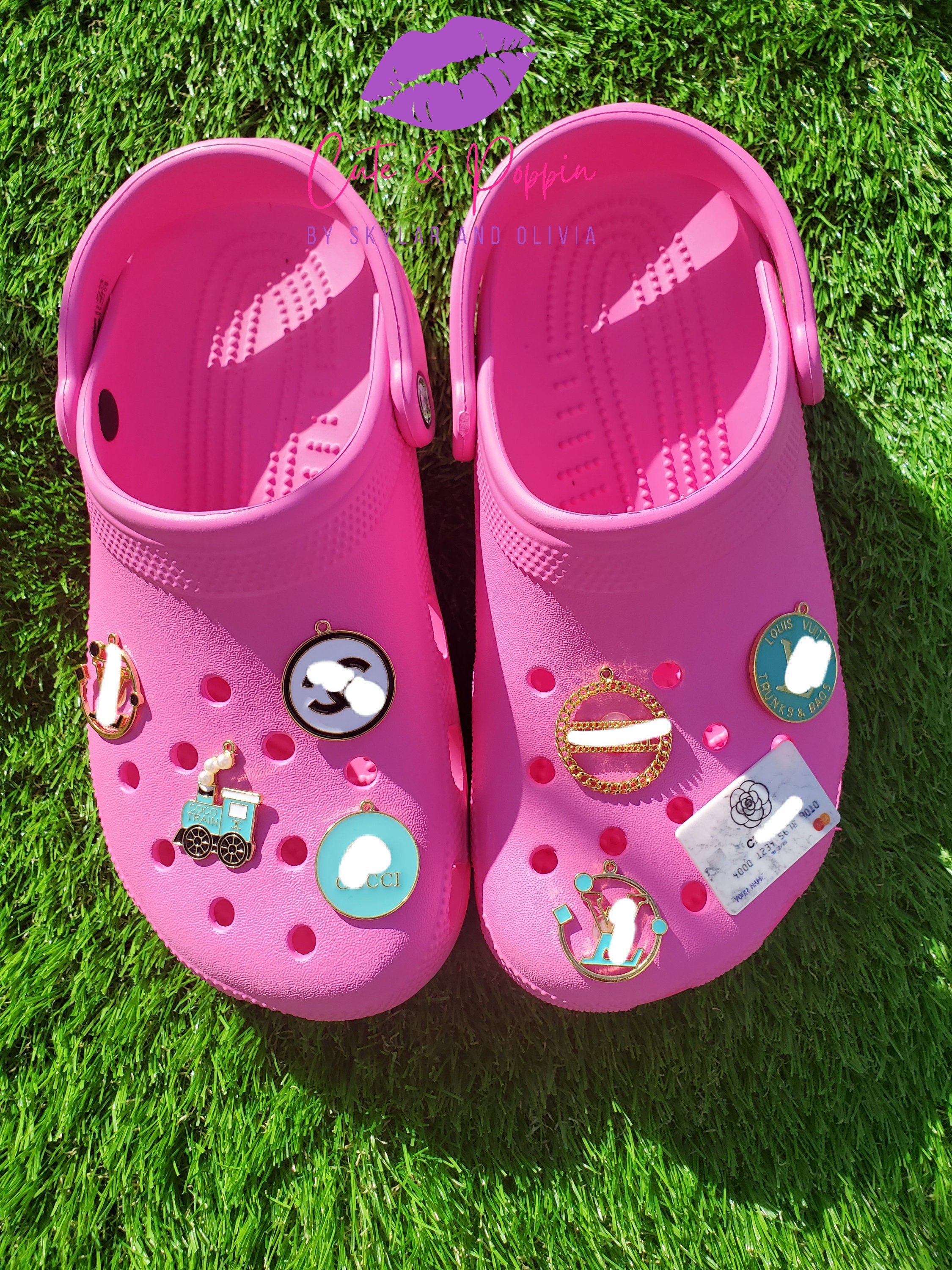 pink crocs with charms