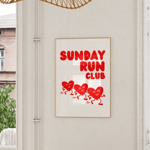 May include: A white poster with the text "SUNDAY RUN CLUB" in red letters.  Four red hearts with smiling faces are running in a line below the text.