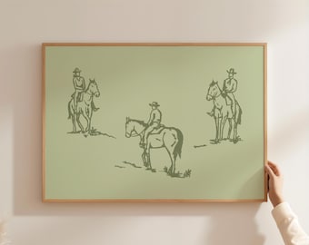 May include: A framed print featuring three riders on horseback, rendered in a minimalist style. The riders and horses are depicted in a muted green hue against a light green background. The artwork is encased in a natural wood frame.