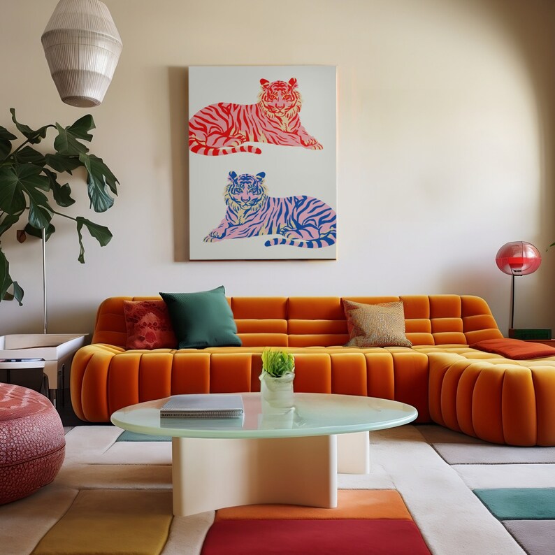 May include: A living room featuring an orange sectional sofa, a coffee table, and a houseplant. A painting depicting two tigers, one pink and one blue, hangs on the wall.