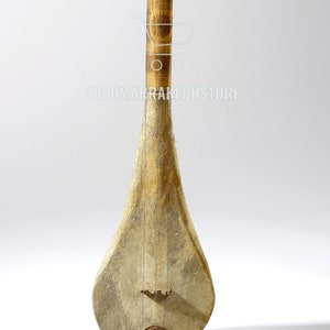 Moroccan Gnawa instruments, Gnawa instruments, soul music Guembri bass Gnawa