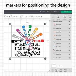 May include: A design for a craft project featuring the text "My job is all rainbows & butterflies" with a rainbow of markers arranged in a circle around the text. The design is on a gridded background.