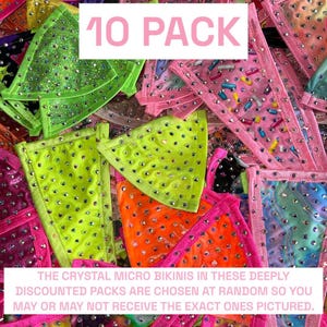May include: A collection of crystal micro bikinis in various colors, including neon green, pink, and orange. Each bikini is embellished with rhinestones. The text "10 PACK" is displayed at the top, with additional text at the bottom.