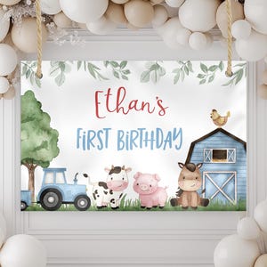 May include: A blue and white farm-themed first birthday banner with the name "Ethan's" and the text "First Birthday". The banner features a blue tractor, a cow, a pig, a horse, a barn, and green foliage.