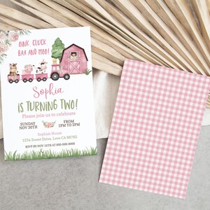 May include: A pink and green farm-themed birthday invitation for a girl's second birthday party. The invitation features a pink tractor pulling a train of farm animals, a red barn, and the text "Sophia is turning two!"  Please join us to celebrate Sunday Nov 30th from 1pm to 3pm. Sophia's House 1234 Sweet Drive, Love CA 98765 RSVP by Nov 15th at 000-000-0000