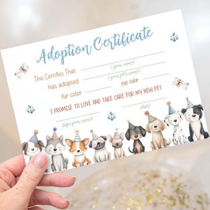 Könnte beinhalten: Eine weiße Adoptionsurkunde mit blauem Text und Pfotenabdruck-Akzenten. Die Urkunde enthält Felder zum Ausfüllen von Tierdetails und eine Reihe von Cartoon-Hunden mit Partyhüten. Der Text lautet "Adoptionsurkunde".