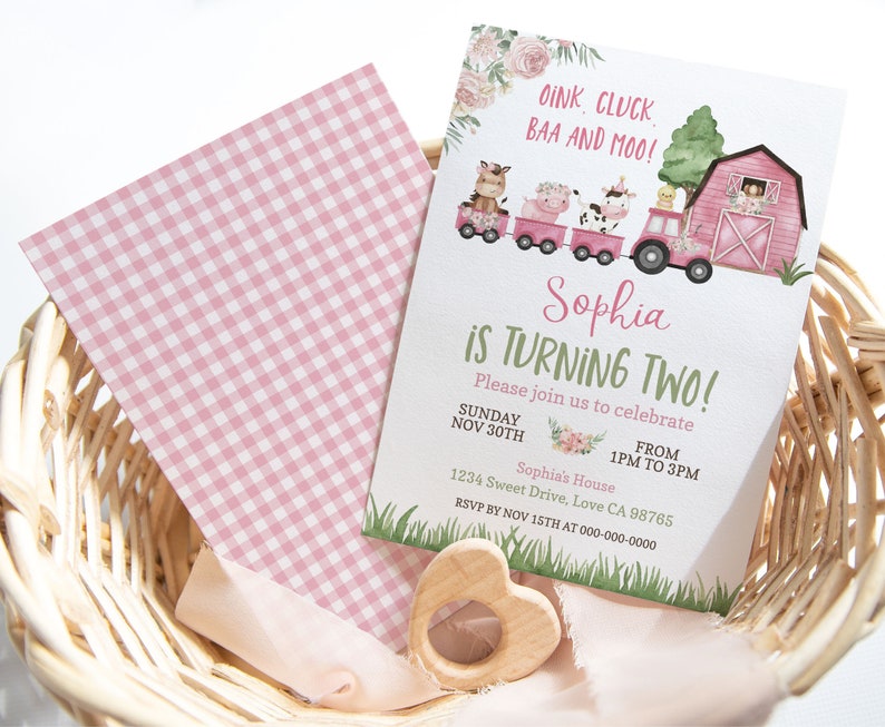May include: Pink and green farm-themed birthday invitation with a red barn, animals, and a train. The invitation says "Sophia is turning two!" and includes the date, time, and location of the party. RSVP by November 15th.