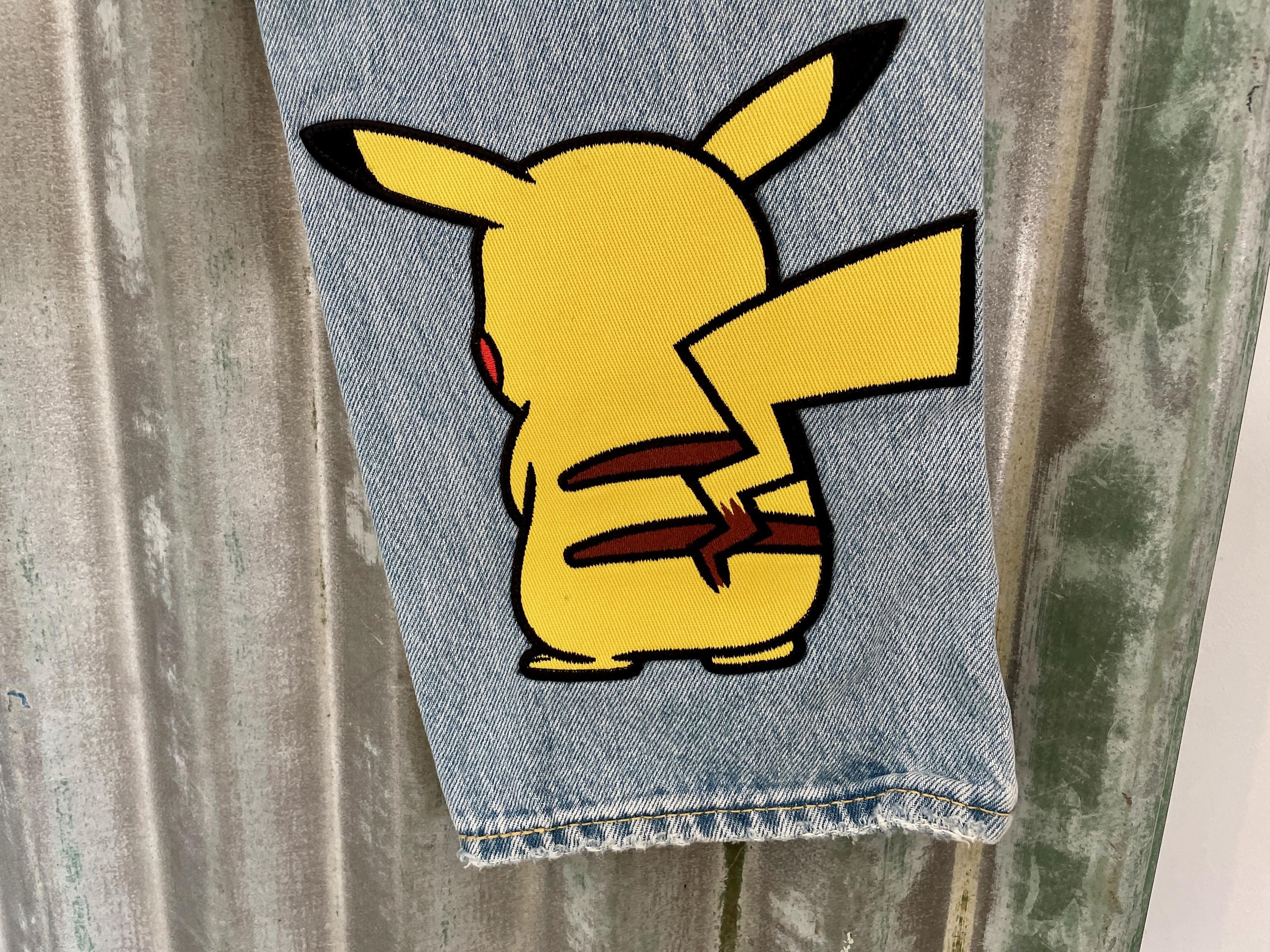 1990's Vintage Levi's Pikachu Pokemon Blue Jeans Sz W 30 L 32
