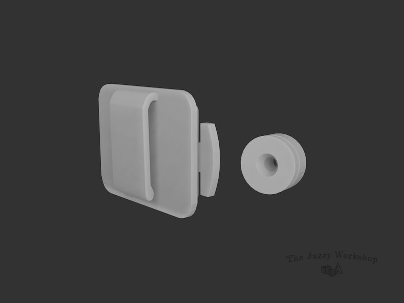 May include: A white plastic clip with a small hole in the center. The clip is designed to attach to a surface and has a small, white plastic ring attached to it.