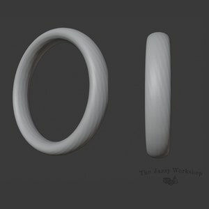 May include: A simple, smooth, silver ring with a slightly rounded edge.