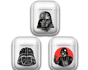 May include: Three white Airpod cases with different Darth Vader designs. The first case features a black and white illustration of Darth Vader's helmet with a skull inside. The second case features a black and white design of Darth Vader's helmet made up of words related to the Star Wars character. The third case features a red circle with a black and white illustration of Darth Vader in the centre.