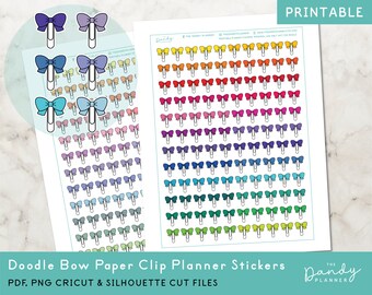 May include: Printable planner stickers featuring a rainbow of colors with a doodle bow paper clip design. The stickers are designed for use with a planner or journal.