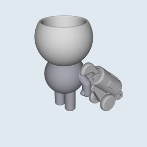 Op de afbeelding: Een grijs cartoonfiguur met een groot hoofd en een klein lichaam duwt een grijs speelgoedkanon op wielen.