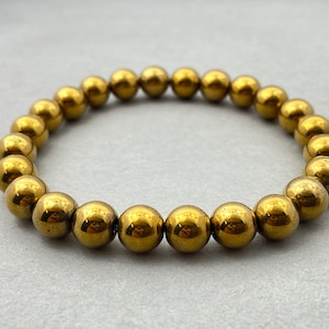 Bracciale in ematite d'oro, braccialetti per la guarigione, bracciale per regalo, bracciale da uomo e da donna, cristallo curativo, boho, perline da 8 mm, bracciale con perline