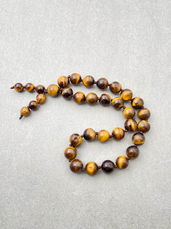 イエロータイガーアイポケットマーラー – 27+1ビーズ、手作り瞑想