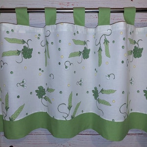 May include: A white valance with a green border features a repeating pattern of green pea pods, leaves, and white flowers.