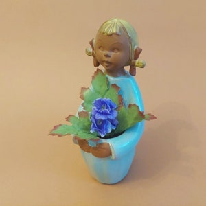 Goebel Ceramic Flower Girl; Germany Vintage 68s Vase-Girl Figurine; Ceramic Bud Vase H 5 7/8&#39;&#39;(15cm) x W 2.75&#39;&#39; (7cm) x Depth 3&#39;&#39;(7.7cm)